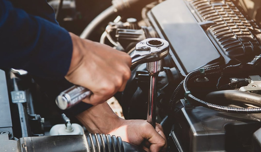 Mechanic working on Car's Engine